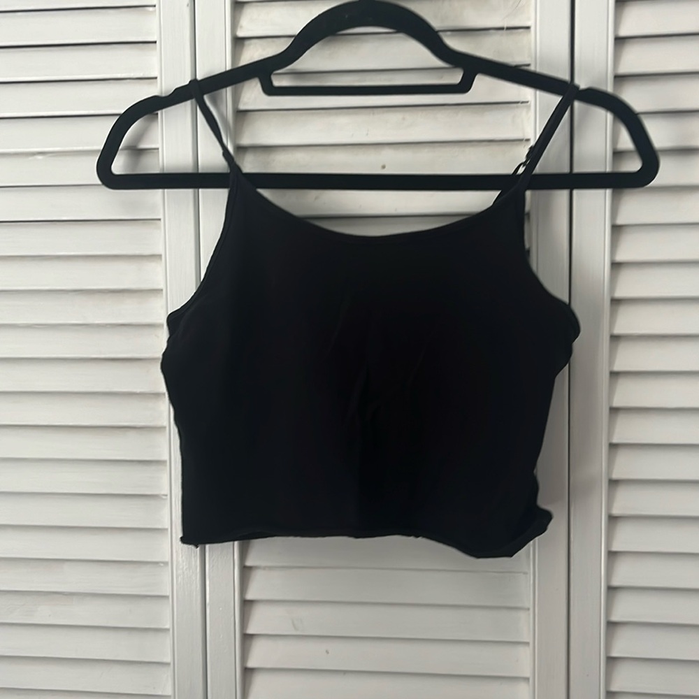 3 for 20$ children’s place black tank top. Not professionally cropped.